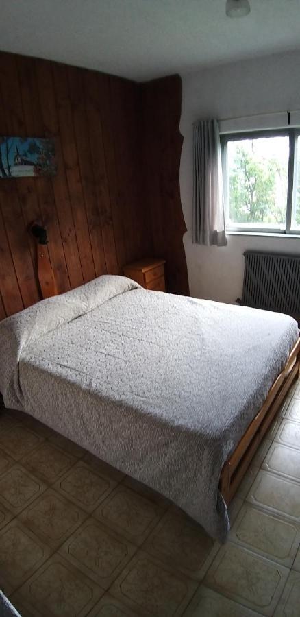 Habitación matrimonial cálida del Residencial Panorámico